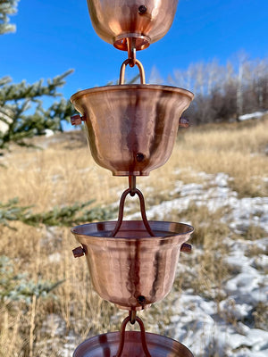 Bell Cups Rain Chain showing multiple cups with hammered copper finish