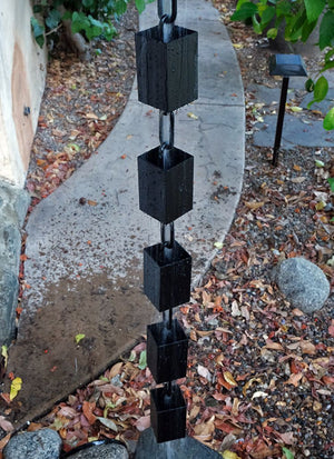 Square Kenchiku Rain Chain in Black during rain storm